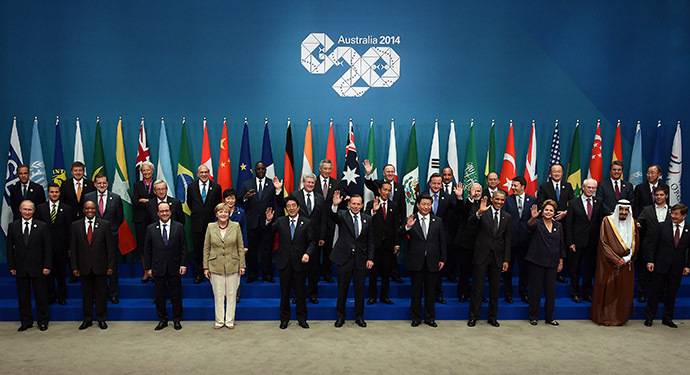 Heads of states and international organizations pose for the "family photo" during the G20 Summit in Brisbane on November 15, 2014. (AFP Photo/Saeed Khan)