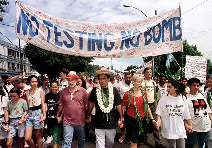ARCHIVE PHOTO: French Polynesian anti-nuclear demonstrators march through the streets of the Tahitian capital Papeete in protest against the French nuclear testing in the Pacific March 22, 1996 (Reuters)