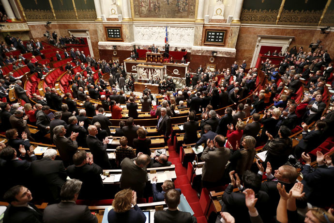 General view of the hemicycle as deputies applaud after the results of the vote on Palestine status at the National Assembly in Paris December 2, 2014. (Reuters/Charles Platiau)