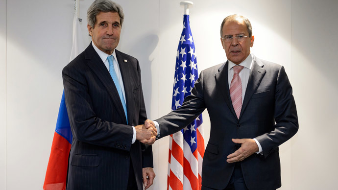 U.S. Secretary of State John Kerry (L) shake hands with Russia's Foreign Minister Sergey Lavrov at the meeting of foreign ministers from the Organization for Security and Cooperation in Europe (OSCE) in Basel December 4, 2014.(Reuters / Fabrice Coffrini)