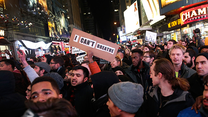 Demonstrators fill 7th Avenue in Times Square as they protest a grand jury decision not to charge a New York policeman in the choking death of Eric Garner, in New York December 4, 2014 (Reuters / Mike Segar)