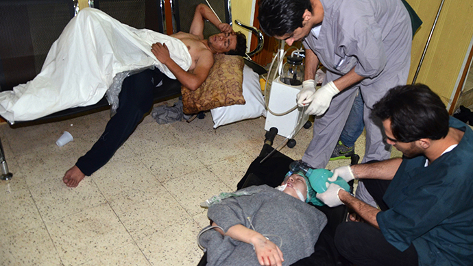 People, affected by what activists say is nerve gas, are treated at a hospital in the Duma neighbourhood of Damascus August 21, 2013. (Reuters)
