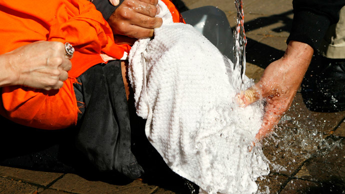 Senate accuses CIA of torturing prisoners, overstepping legal boundaries