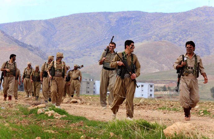 Iranian Kurdish Peshmerga members of the Kurdistan Democratic Party of (KDP-Iran) take part in routine military exercises in Koya, 100 kms north of Arbil, the capital of the autonomous Kurdish region of northern Iraq, on December 9, 2014. (AFP Photo)