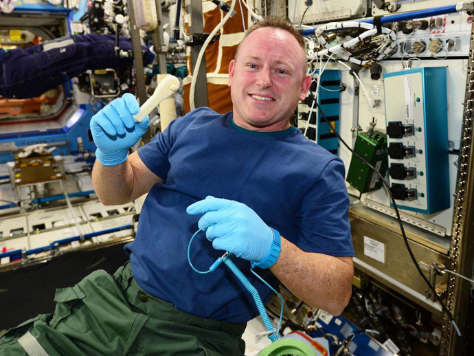 ISS Commander Barry âButchâ Wilmore holds up the ratcheting socket wrench on the space station right after we 3D-printed it (Image Credit: NASA)