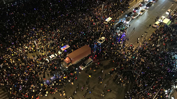 36 killed in Shanghai New Year’s stampede after crowd rushes for fake money