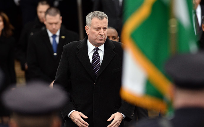 New York City Mayor Bill de Blasio attends the funeral of New York Police Department (NYPD) officer Wenjian Liu in New York's borough of Brooklyn on January 4, 2015. (AFP Photo/Jewel Samad)