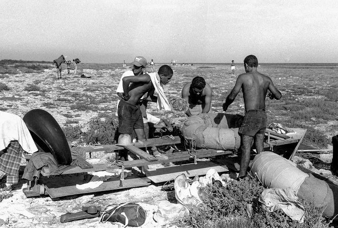 People prepare to launch a makeshift boat into the Straits of Florida towards the US, on the last day of the 1994 Cuban raft exodus in Havana (Reuters/Rolando Pujol Rodriguez)