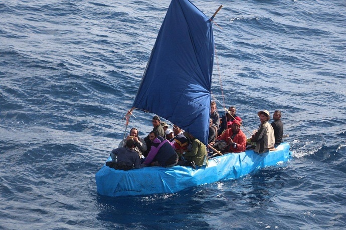 Cuban migrants sail a rustic vessel south of Key West, Florida, Jan. 1, 2015. The 24 were later repatriated to Bahia de CabaÃ±as, Cuba (US Coast Guard)