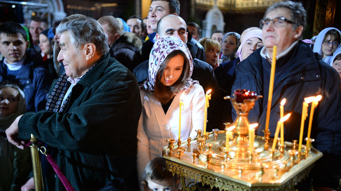 Believers seen here at the Cathedral of Christ the Savior in Moscow prior to the Christmas Eve service.(RIA Novosti / Vladimir Astapkovich)
