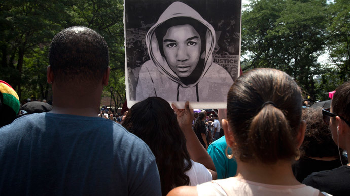 An image of Trayvon Martin is displayed during a rally in New York.(Reuters / Carlo Allegri )