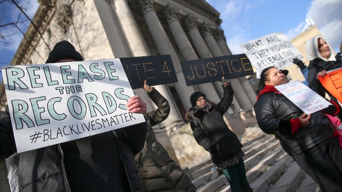 Demonstrators stand outside the State Supreme Court before the hearing for Eric Garner, who was killed after a policeman put him in a chokehold while being arrested for peddling loose cigarettes, in the Staten Island borough of New York January 5, 2015.(Reuters / Shannon Stapleton)