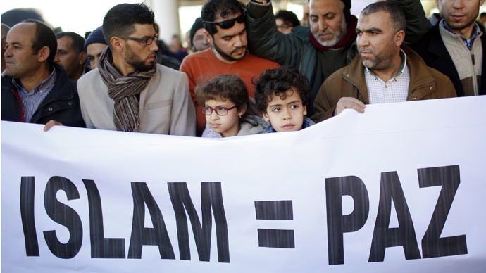 'Terrorism has no religion': Muslims in France and abroad pay tribute to Charlie Hebdo victims (PHOTOS)