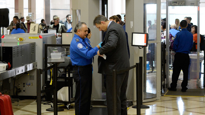 US steps up airport, federal building security after Paris attacks