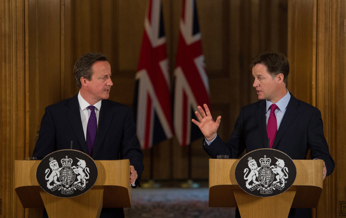 Britain's Prime Minister David Cameron (L) and Deputy Prime Minister Nick Clegg. (AFP Photo/Stefan Rousseau)