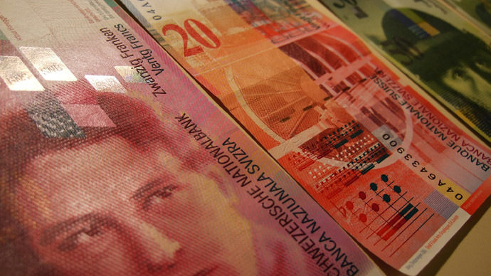 Swiss franc skyrockets to record level after central bank removes euro peg