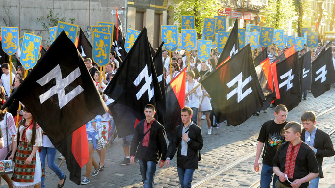 Supporters of the Ukrainian nationalist movement rally in downtown Lviv on April 28, 2012 to mark the 68th anniversary of the formation of the Ukrainian Galacian Division of the Waffen SS (AFP Photo / Yuriy Dyachyshyn)