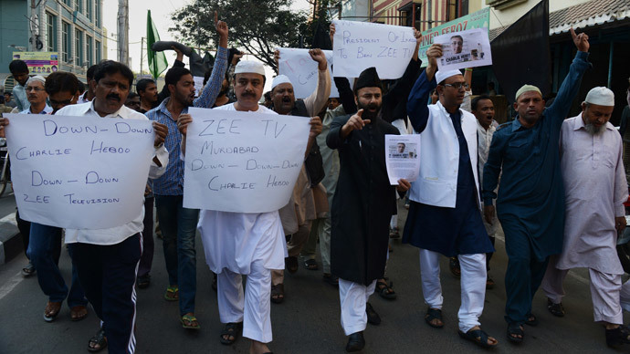 Indian Muslim activists from the Majlis Bachao Tahreek (MBT) shout slogans against the printing of satirical sketches of the Prophet Muhammad by French magazine Charlie Hebdo during a protest in Hyderabad on January 16, 2015.(AFP Photo / Noah Seelam)