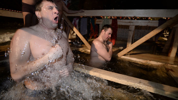 Russian Orthodox Christians take chilling plunge to mark Epiphany (PHOTOS, VIDEO)