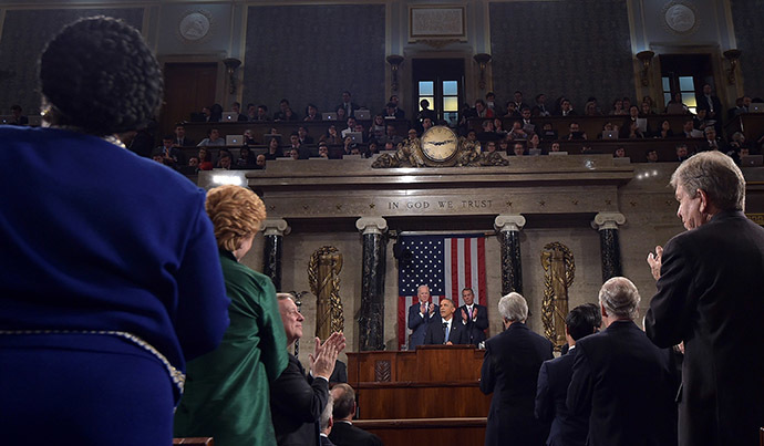 U.S. President Barack Obama (C) is applauded while delivering his State of the Union address to a joint session of Congress on Capitol Hill in Washington, January 20, 2015. (Reuters/Mandel Ngan)