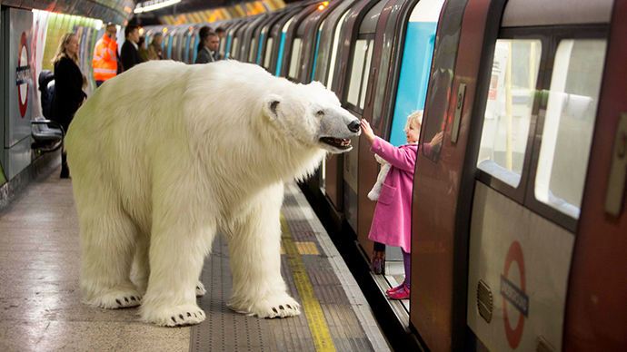 Mind the bear! 8-foot Arctic giant roams London Tube & streets... to promote TV series