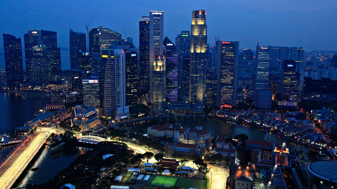 Singapore latest to join currency wars, hits 2010 low