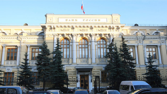 Russia's Central Bank unexpectedly slashes rate to 15%, ruble reels