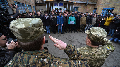 Potential conscripts evade draft, flee country amid escalation in E. Ukraine