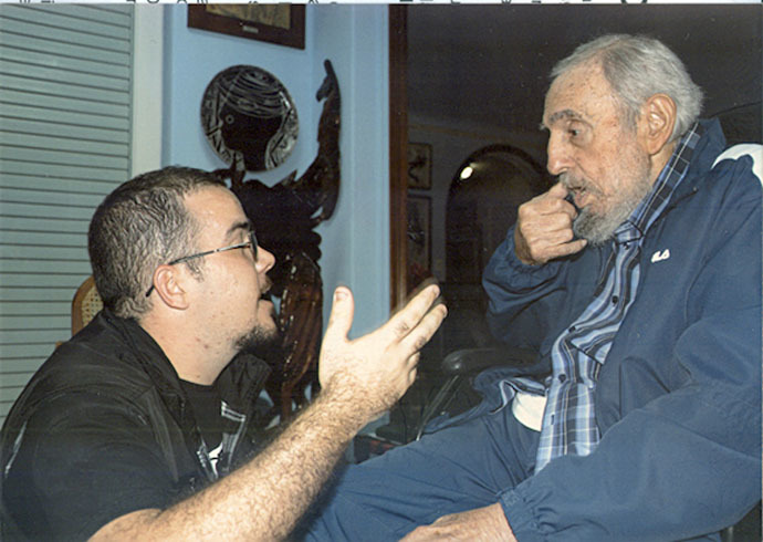 Former Cuban President Fidel Castro talks to President of Cuba's University Students Federation (FEU) Randy Perdomo during a meeting in Havana in this picture provided by Cubadebate. (Reuters/Cubadebate/Handout via Reuters)