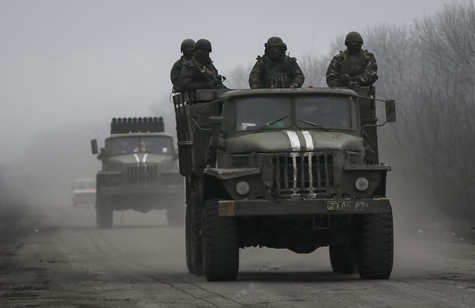 Members of the Ukrainian armed forces ride on a military vehicle near Artemivsk, eastern Ukraine. (Reuters/Gleb Garanich)