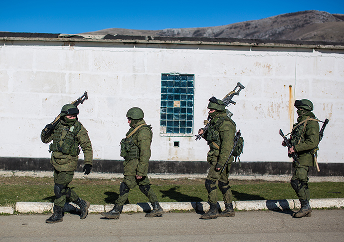 Soldiers near a military base in the village of Perevalnoe, Crimea where a coastal defense brigade blocked the Ukrainian Navy (RIA Novosti)