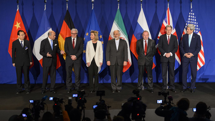 P5+1 and Iran representative pose prior to the announcement of an agreement on Iran nuclear talks on April 2, 2015 at the The Swiss Federal Institutes of Technology (EPFL) in Lausanne.(AFP Photo / Fabrice Coffrini )