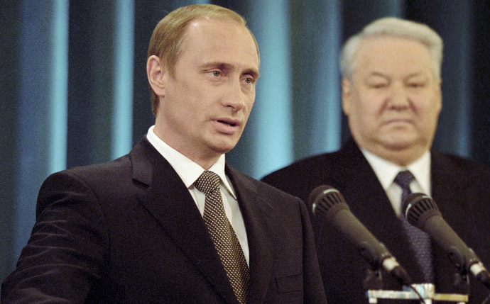 Vladimir Putin (left) taking the oath of President of the Russian Federation. Right: first Russian president Boris Yeltsin. (RIA Novosti/Vladimir Rodionov)