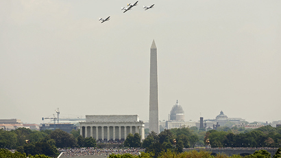 Historic planes on parade over National Mall in WWII commemoration