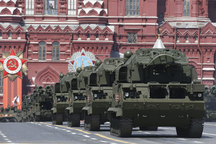 Russian TOR-M2U tactical surface-to-air missile systems drive during the Victory Day parade at Red Square in Moscow, Russia, May 9, 2015. (Reuters/Sergei Karpukhin)