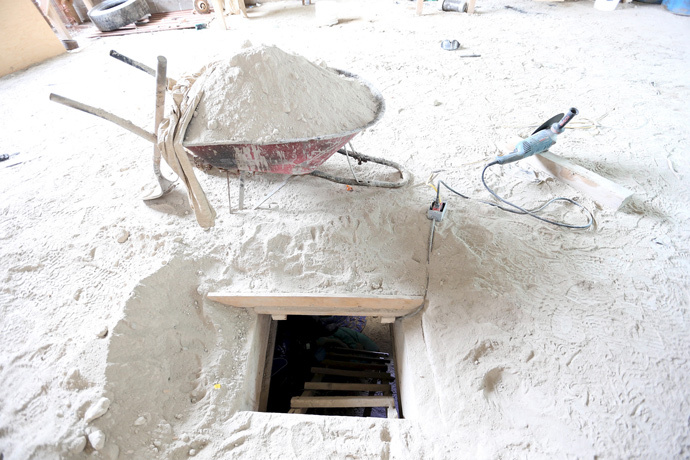 The entrance of a tunnel connected to the Altiplano Federal Penitentiary and used by drug lord Joaquin 'El Chapo' Guzman to escape, is seen in Almoloya de Juarez, on the outskirts of Mexico City, July 12, 2015. (Reuters / PGR - Attorney General's Office / Handout)