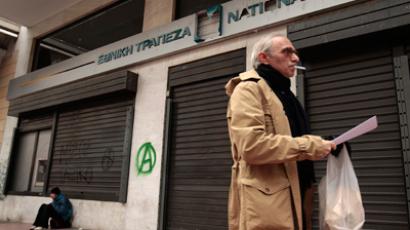 Greece tightens screws on creditors to accept haircut