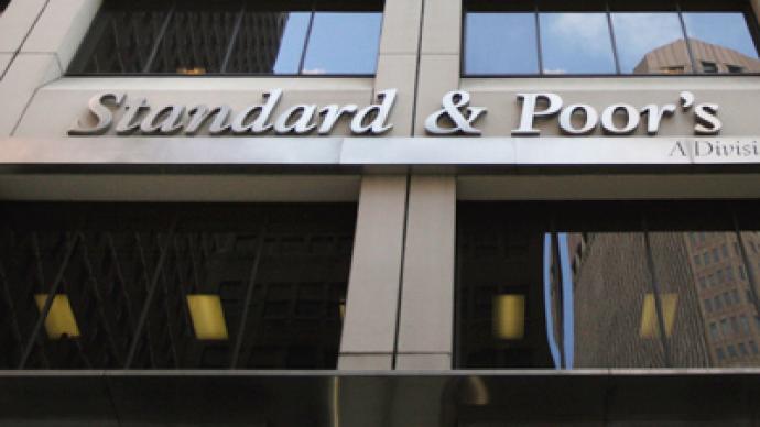Markets stay firm despite Spanish downgrade