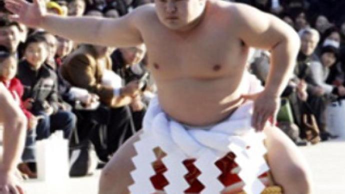 Sumo wrestler punished for playing football in secret