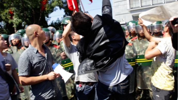 Chinese protesters attack Japanese embassy in Beijing over island dispute