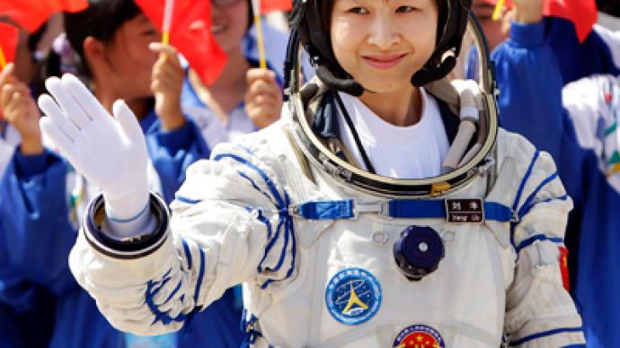 China sends its first manned space docking mission...and first woman astronaut