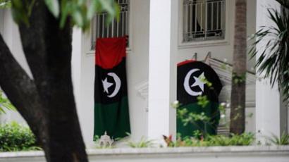 NATO vows to remain in Libya 