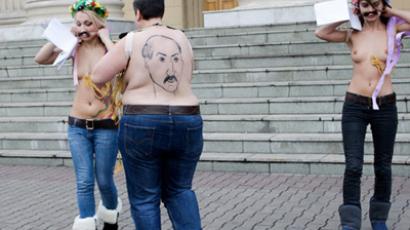 Topless players challenge Lukashenko on Swiss ice
