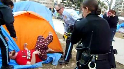 Four arrested as police clear Occupy tent camp in DC