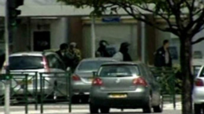 Paris hostage drama ends peacefully