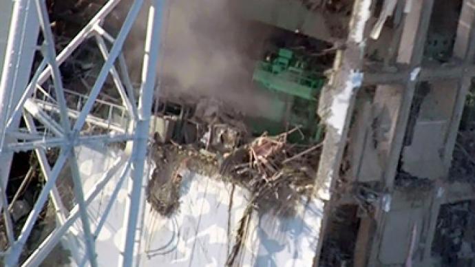Japan races to restore cooling at nuke plant
