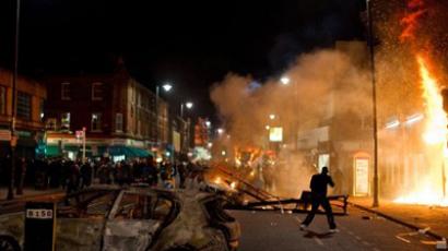 UK lays off police despite riots