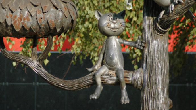 Superstitious fans leave statue of animated cat without whiskers