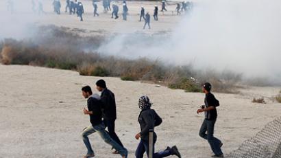 Bahraini police fire tear gas at thousands of pro-Rajab protesters
