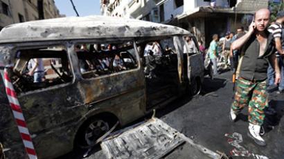 At least 34 people killed in twin blasts in Damascus